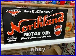 NORTHLAND MOTOR OIL EMBOSSED METAL SIGN (29.5x 15.5) EXCELLENT CONDITION