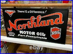 NORTHLAND MOTOR OIL EMBOSSED METAL SIGN (29.5x 15.5) EXCELLENT CONDITION