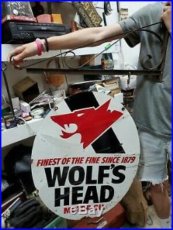 Original 1971 Wolf's Head Motor Oil Oval Steel 2-sided sign 30x23 Gas Station