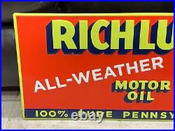 RICHLUBE MOTOR OIL EMBOSSED METAL DEALER SIGN (23.5x 11.5) NICE CONDITION