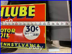 RICHLUBE MOTOR OIL EMBOSSED METAL DEALER SIGN (23.5x 11.5) NICE CONDITION