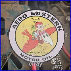 Vintage 1940 Aero Eastern Motor Oil Pinocchio Porcelain Gas Oil 4.5 Sign