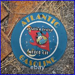 Vintage 1945 Atlantic Aviation Motor Oil Huckleberry Hound Porcelain 4.5 Sign