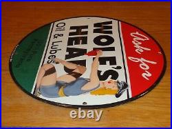 Vintage 1948 Wolf's Head Motor Oil Model 11 3/4 Porcelain Metal Gasoline Sign