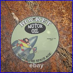 Vintage 1967 Rocket Motor Oil Mighty Mouse Porcelain Gas Oil 4.5 Sign