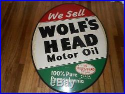 Vintage AM 9-52 We Sell WOLFS HEAD Motor Oil Oval Advertising SIGN
